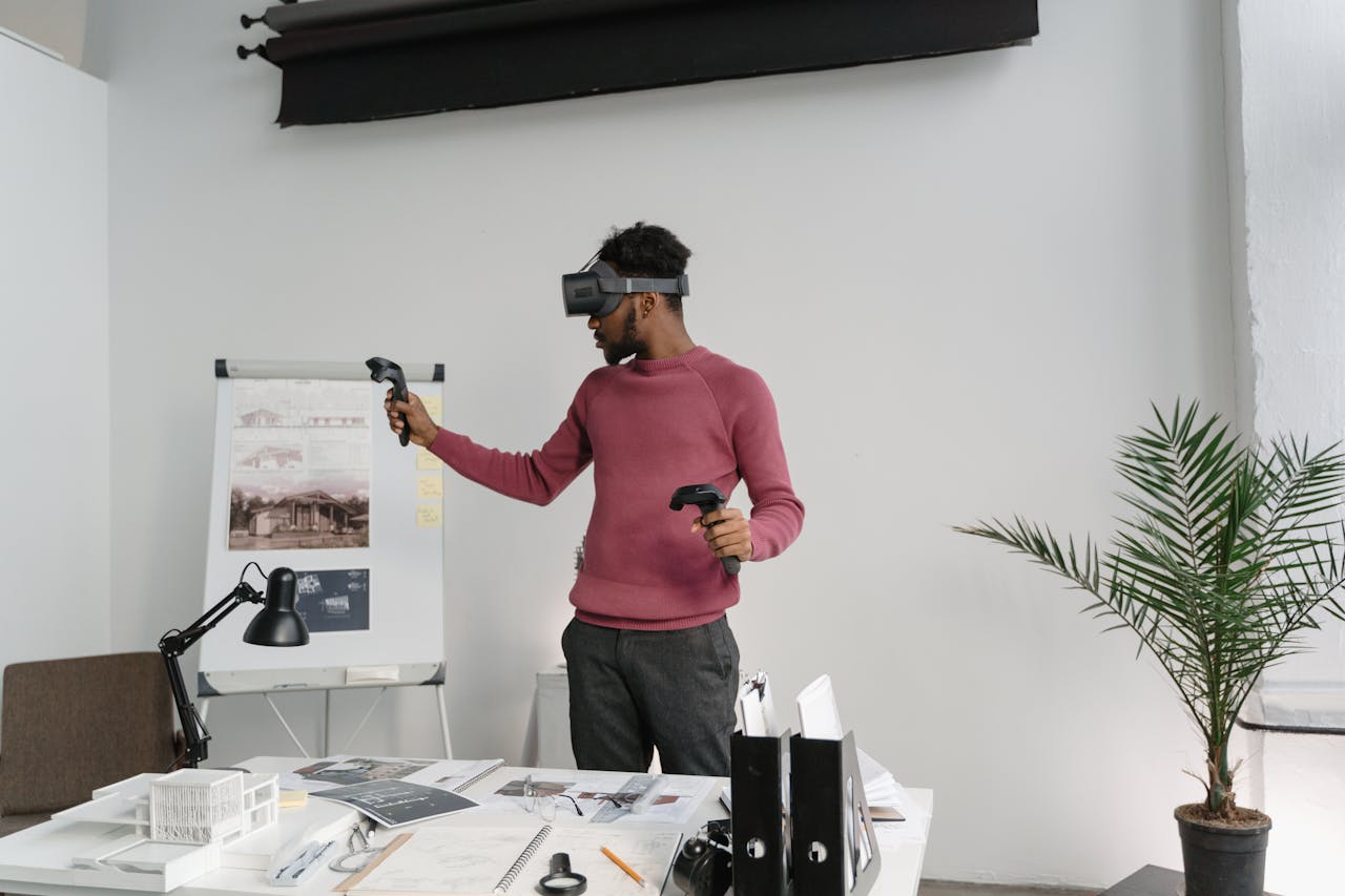 Young architect explores designs using VR technology in a stylish office setting.